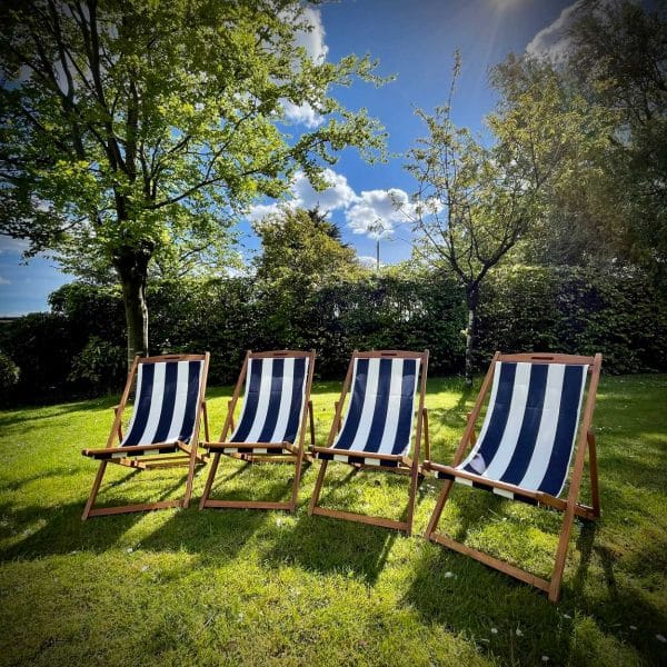 Deck Chairs for Hire - Navy striped deck chairs for hire.